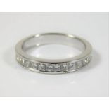 An 18ct white gold ring set with 1.1ct of princess