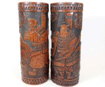 A pair of carved Japanese brush pots 12in