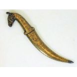 An antique Islamic dagger with horse head design w