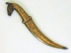 An antique Islamic dagger with horse head design w