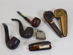 A small selection of pipes etc. including one case
