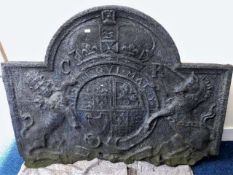A 17thC. Charles I armorial cast iron fireback, so