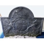 A 17thC. Charles I armorial cast iron fireback, so