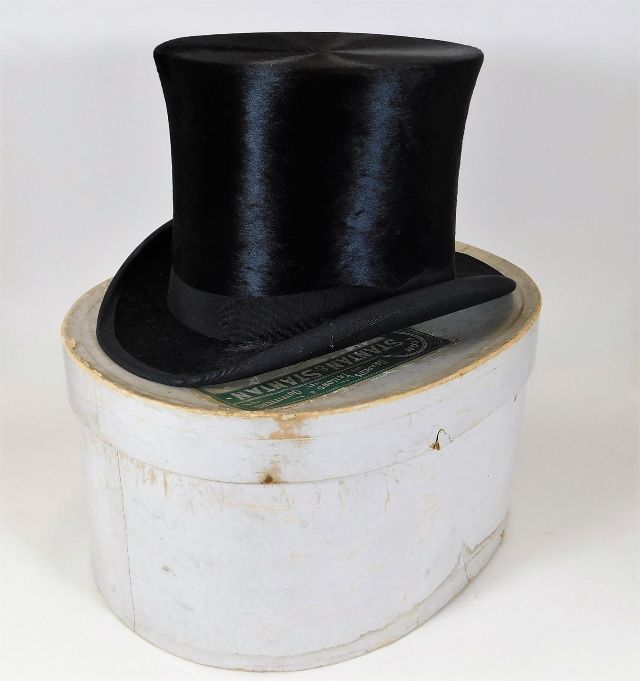 An antique gentleman's top hat with box, size 6 7/