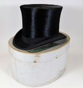 An antique gentleman's top hat with box, size 6 7/