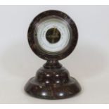 A Cornish serpentine mounted barometer