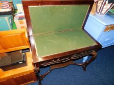 A 19thC. carved mahogany card table, some faults