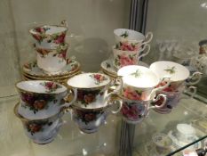 Two sets of Royal Albert trios including county ro