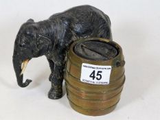 A c.1900 cold painted spelter elephant with brass