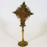 A 19thC. gilt bronze crucifix with coral