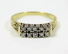 A 14ct gold diamond ring set with ten stones 3g si
