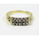 A 14ct gold diamond ring set with ten stones 3g si