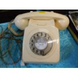 A 20thC. cream coloured dial phone