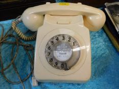 A 20thC. cream coloured dial phone