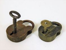 Two small working padlocks with keys
