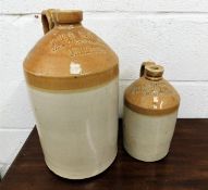 Two stoneware flagons, Lee's Stores Crediton & Shu