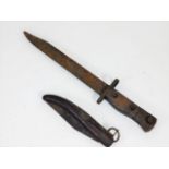 A military bayonet twinned with an Asian style fol