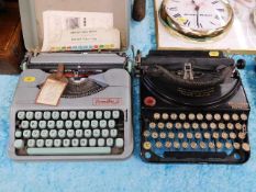 A Remington portable typewriter & one other