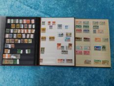 Three world stamp albums
