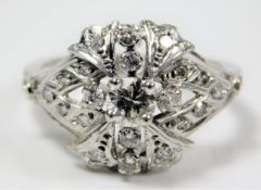 A 14ct white gold ring set with diamonds, centre stone being 0.5ct 4.5g size P/Q