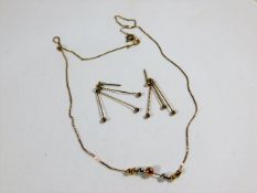 A 9ct gold necklace with tri-colour gold beads twi