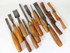 A quantity of mostly antique walnut handled chisel