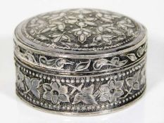 A small silver patch box with embossed organic rel