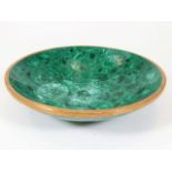 A 19thC. malachite bowl with gilt bronze rim 7.5in