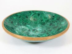 A 19thC. malachite bowl with gilt bronze rim 7.5in
