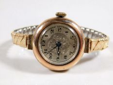 A ladies rose gold coloured case wristwatch