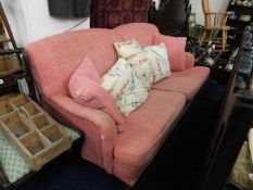 A modern upholstered sofa with cushions, bought from Brights Of Nettlebed, Berkshire. Provenance:Fro