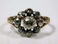 A 19thC. yellow metal ring set with diamonds 3.1g
