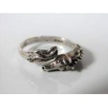 A hallmarked silver horse ring