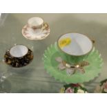 Three miniature dolls house style cups & saucers
