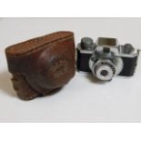 A vintage miniature Fat Max camera & case