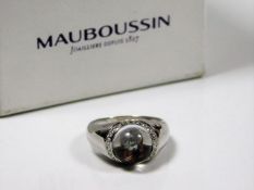 A Mauboussin 18ct gold ring set with diamond & roc