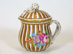 A Dresden porcelain chocolate cup & cover with gil