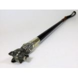 A braided leather riding crop with detailed white metal fox design marked SWAINE to white metal ferr