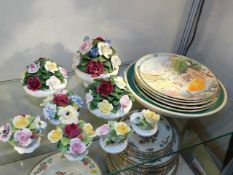 A quantity of floral porcelain items twinned with