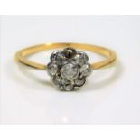 A Victorian 18ct gold diamond daisy ring, approx.