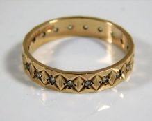 A 9ct gold eternity ring set with white stones 2.4