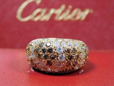 An 18ct gold Cartier Dome Sauvage ring set with wh