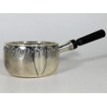 A decorative French silver brandy saucepan with ro