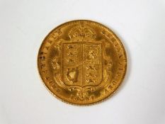 A Victorian half gold sovereign 1887