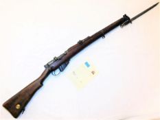 A Mk III 1933/34 Enfield bolt action rifle with magaz