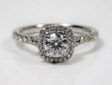 An 18ct white gold diamond encrusted ring set with