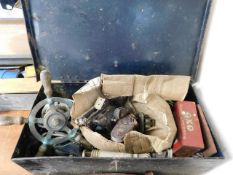 A steel box containing items of boating interest