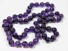 A set of amethyst beads 85g