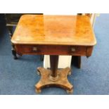 A Victorian pedestal table with drawer