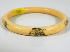 A Victorian ivory bangle